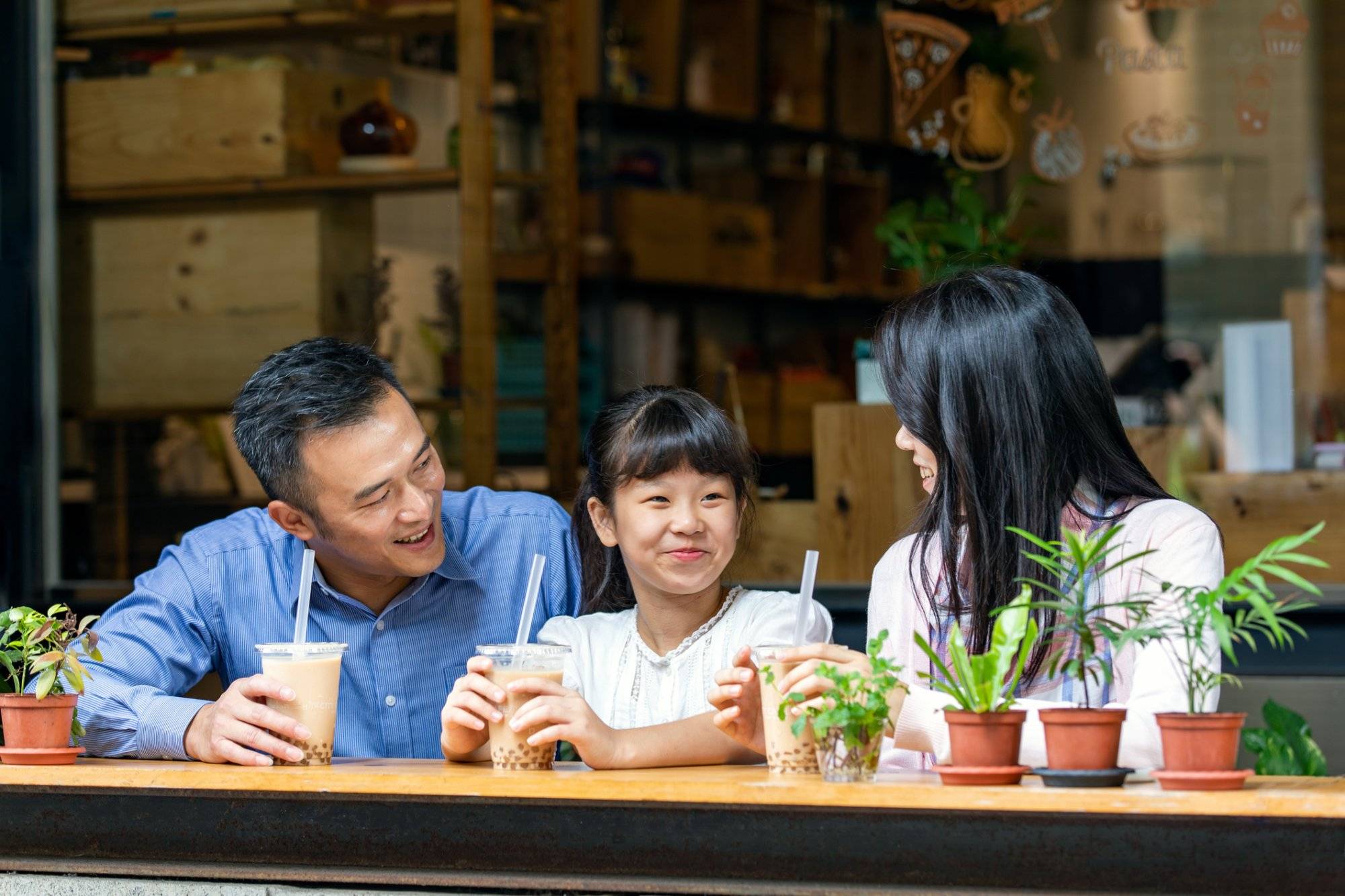 Family drinking boba tea Family drinking boba tea